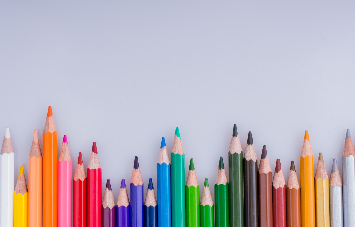 Color Pencils Placed on a White Background